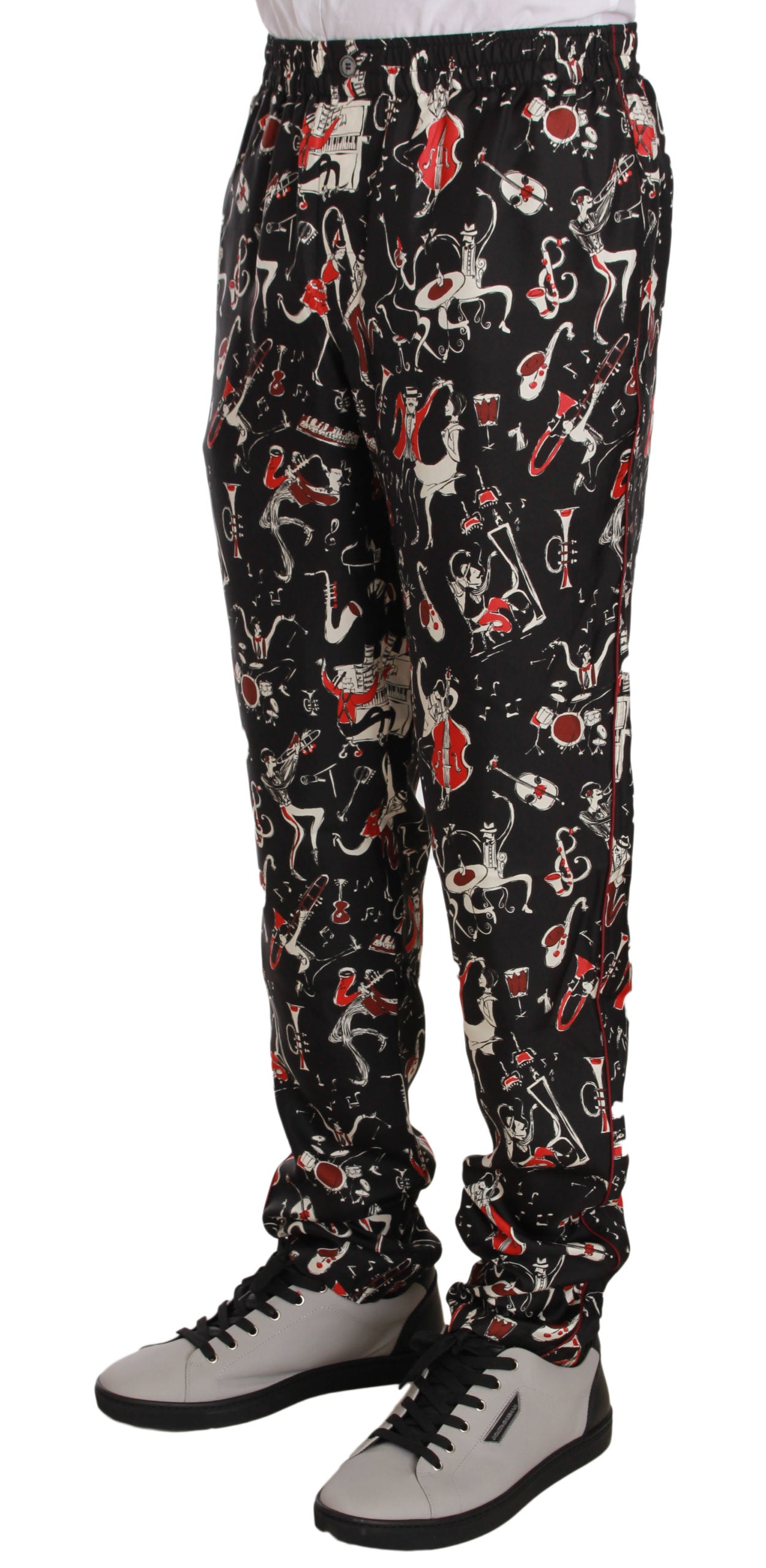 Elegante pantalón lounge de seda negro con estampado rojo