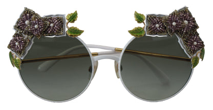 Elegantes gafas de sol doradas con adornos florales