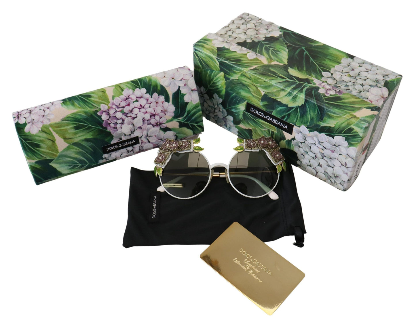 Elegantes gafas de sol doradas con adornos florales