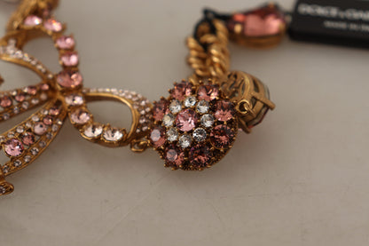 Elegante pulsera de oro con dijes de cristal