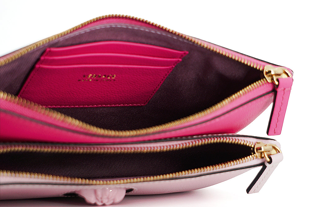 Elegante roze lederen etui-clutch