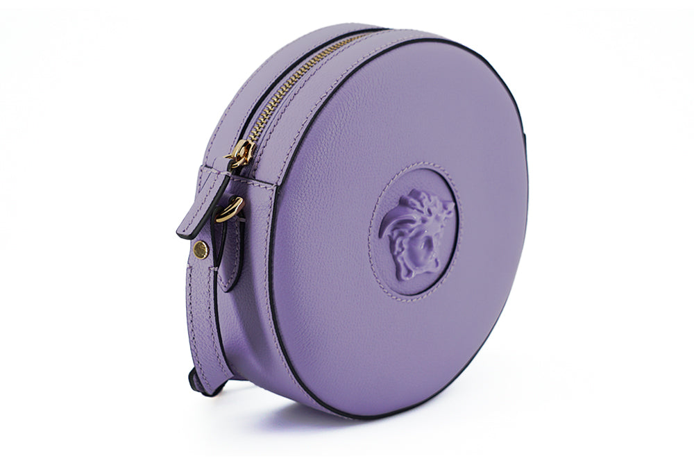 Elegante bolso de hombro redondo morado