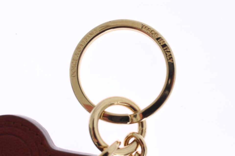 Elegante bruinleren sleutelhanger met gouden details